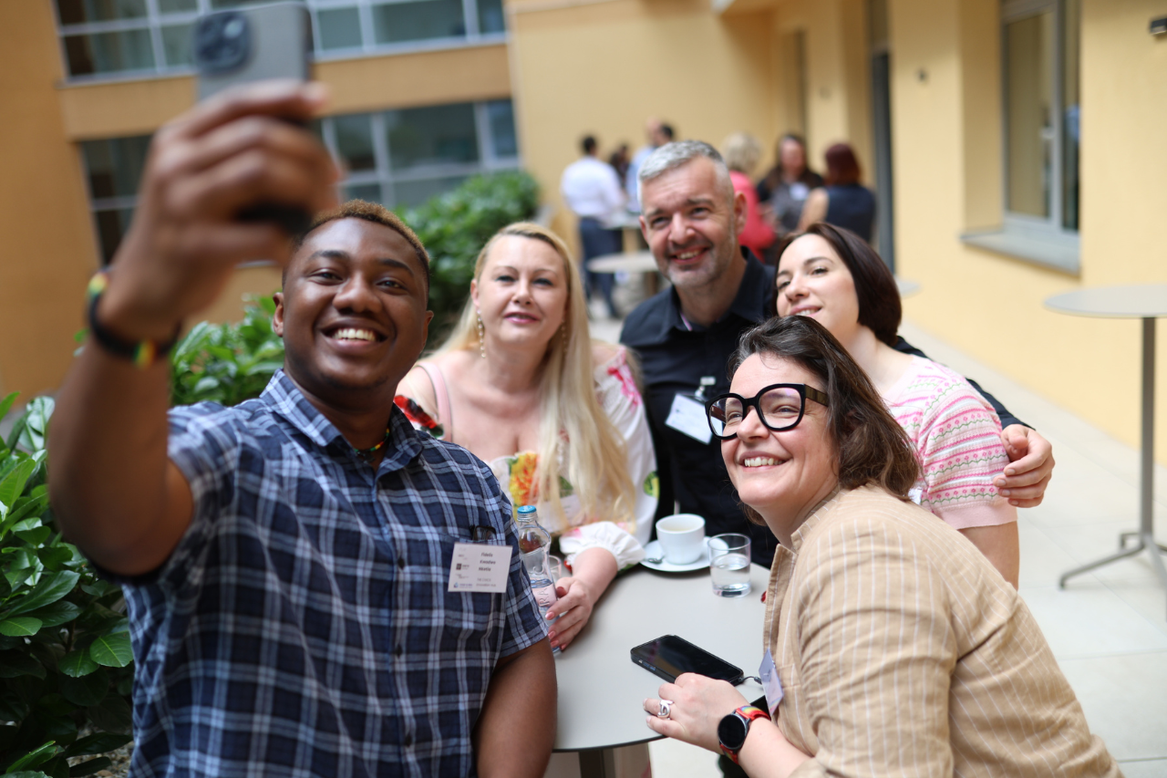 © THE CIVICS Innovation Hub NECE Lab participants taking a selfie and smiling.